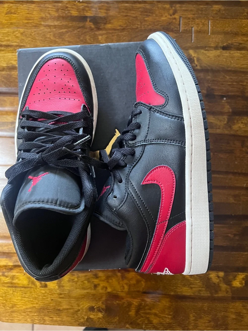 Jordan 1’s High top Sneakers in Black and Red